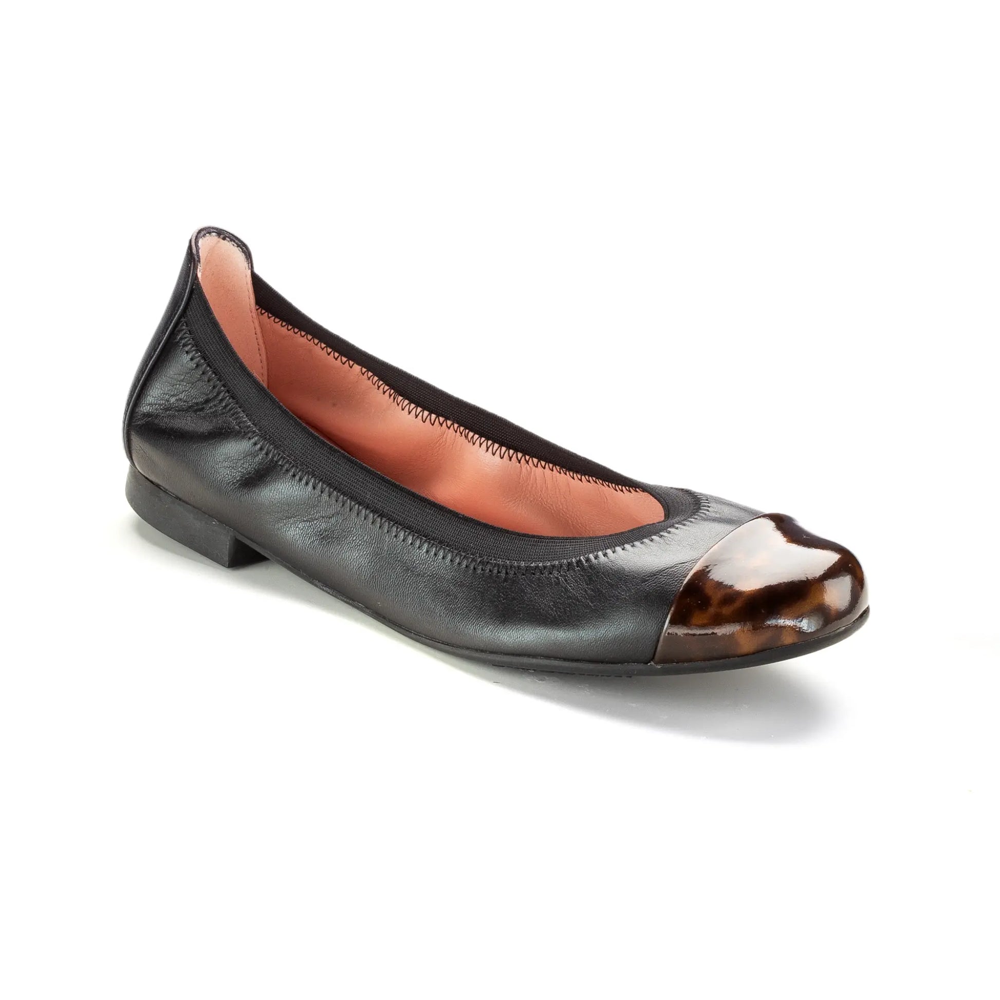 Teen black tortoise tip slip on stretch shoe from Spain