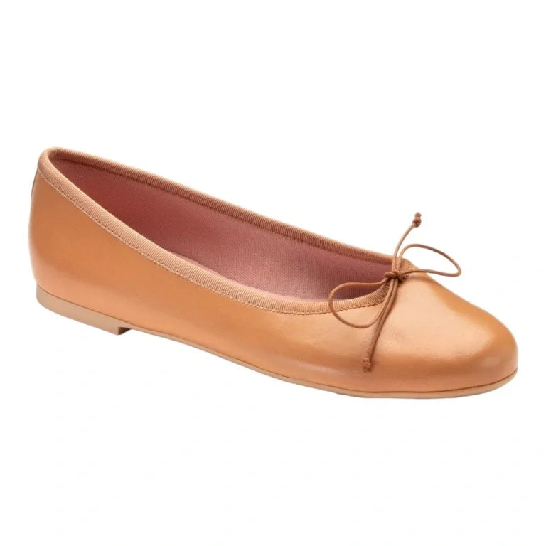 Tan leather teens bow shoe on white background